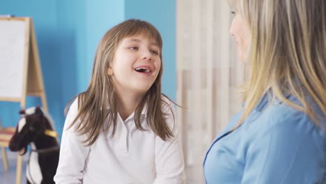 Cute-little-girl-is-telling-her-mother,-talking-to-her.